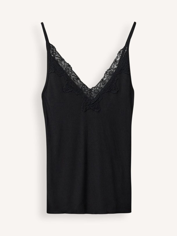 Ontdek de Danilla viscosemix rib top met kant van Sofie Schnoor in de kleur Zwart bij Orangebag. Op werkdagen voor 21:45 besteld, morgen in huis.