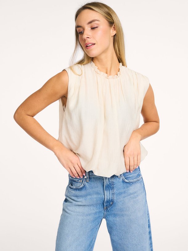 Ontdek de Este geweven balloon fit top van Dante 6 in de kleur Crème bij Orangebag. Op werkdagen voor 21:45 besteld, morgen in huis.