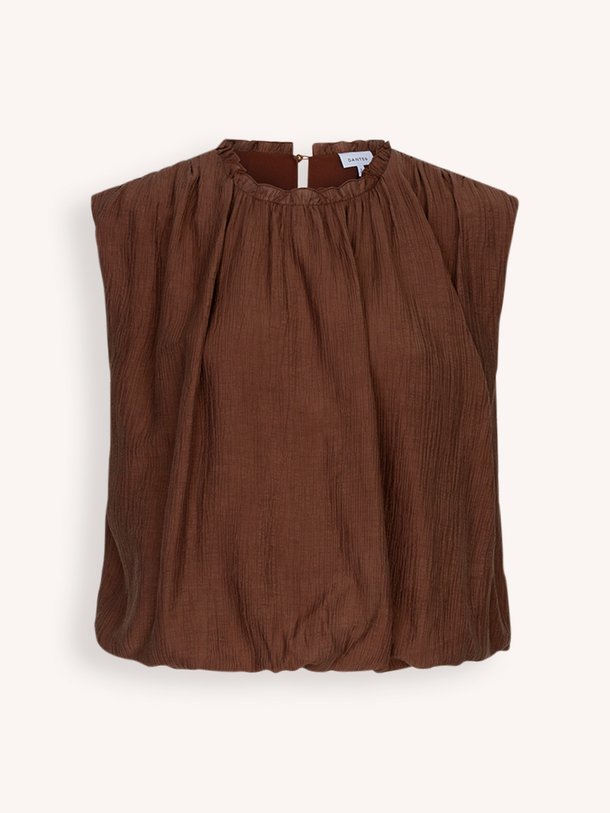 Ontdek de Este geweven ballon fit top van Dante 6 in de kleur Donkerbruin bij Orangebag. Op werkdagen voor 21:45 besteld, morgen in huis.