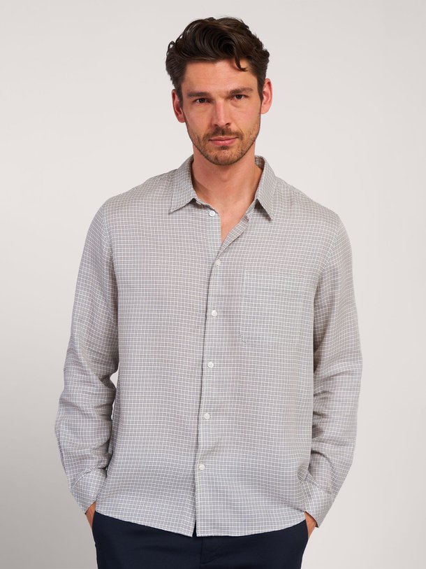 Ontdek de Saryan lyocell overhemd met dessin van Samsoe Samsoe in de kleur crème bij Orangebag. Op werkdagen voor 21:45 besteld, morgen in huis.