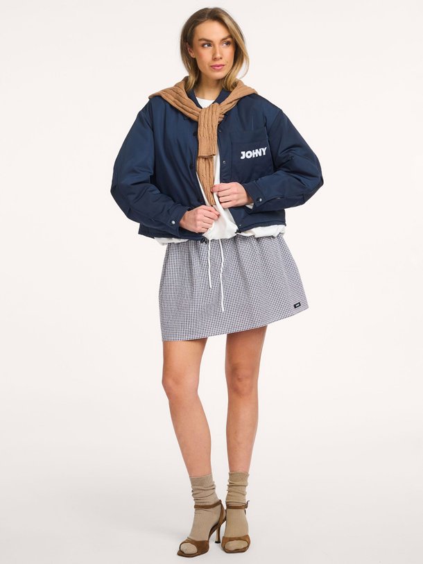 Ontdek de Jess organic cotton geruite rok van Johny in de kleur Donkerblauw bij Orangebag. Op werkdagen voor 21:45 besteld, morgen in huis.