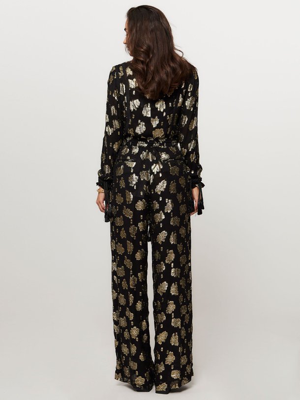 Ontdek de Joggy viscosemix wide leg broek met lurex van Laurence Bras in de kleur zwart bij Orangebag. Op werkdagen voor 21:45 besteld, morgen in huis.