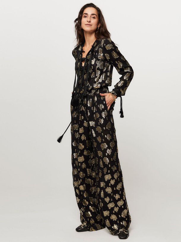 Ontdek de Joggy viscosemix wide leg broek met lurex van Laurence Bras in de kleur zwart bij Orangebag. Op werkdagen voor 21:45 besteld, morgen in huis.
