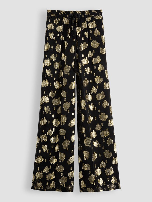 Ontdek de Joggy viscosemix wide leg broek met lurex van Laurence Bras in de kleur zwart bij Orangebag. Op werkdagen voor 21:45 besteld, morgen in huis.