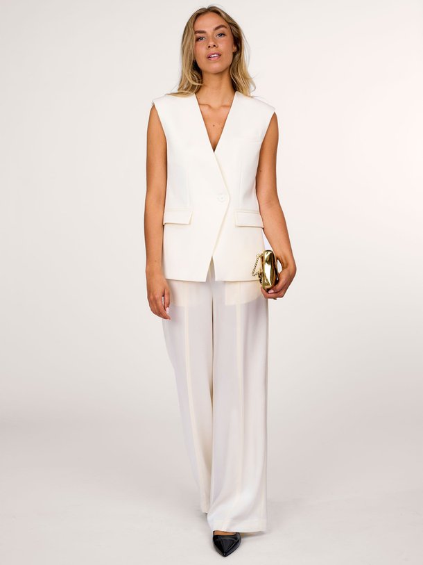 Ontdek de Wolmix gilet van Semicouture in de kleur crème bij Orangebag. Op werkdagen voor 21:45 besteld, morgen in huis.