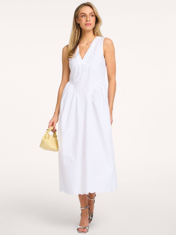 Ontdek de Dori katoenmix midi jurk van Rotate Birger Christensen in de kleur Wit bij Orangebag. Op werkdagen voor 21:45 besteld, morgen in huis.