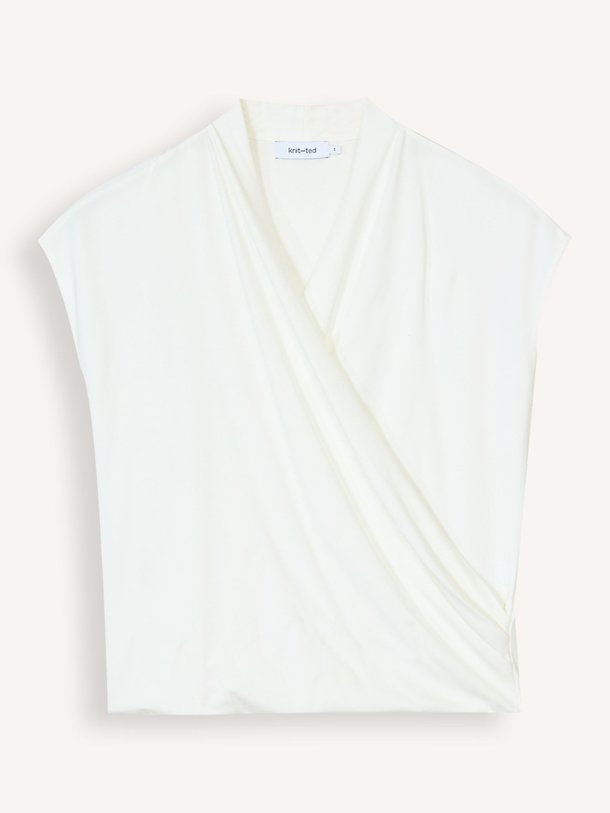 Ontdek de Jet jersey top van Knit-ted in de kleur Off-white bij Orangebag. Op werkdagen voor 21:45 besteld, morgen in huis.