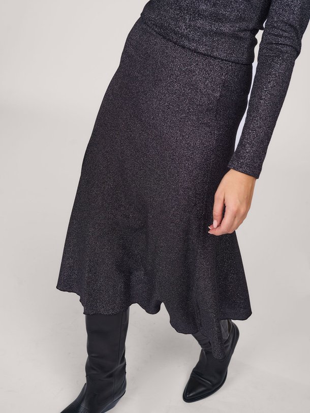 Ontdek de Saga organic cottonmix rib rok met lurex van Mads Norgaard in de kleur zwart bij Orangebag. Op werkdagen voor 21:45 besteld, morgen in huis.