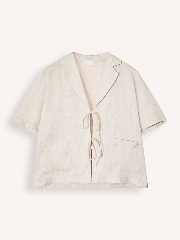 Ontdek de Elaine linnen top van The Lola Club in de kleur Zand bij Orangebag. Op werkdagen voor 21:45 besteld, morgen in huis.