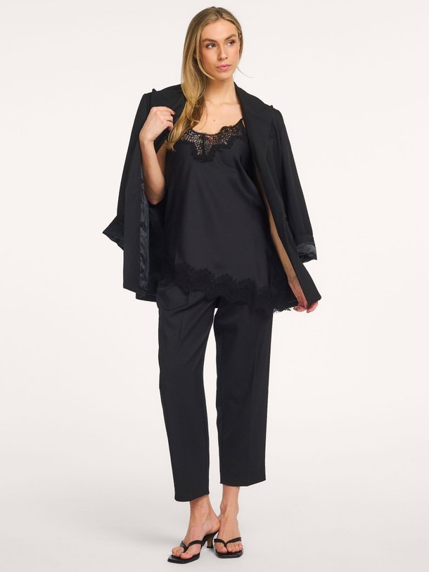 Ontdek de Geweven cropped broek van Haute L'Amitié in de kleur Zwart bij Orangebag. Op werkdagen voor 21:45 besteld, morgen in huis.