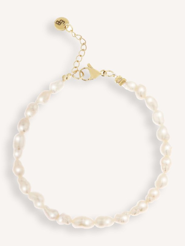 Ontdek de Vergulde armband met parels van Ellen Beekmans in de kleur Parelmoer bij Orangebag. Op werkdagen voor 21:45 besteld, morgen in huis.