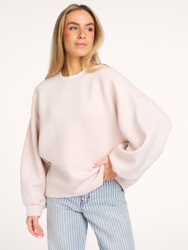 Ontdek de Trig jersey logo sweater van Bellerose in de kleur Crème bij Orangebag. Op werkdagen voor 21:45 besteld, morgen in huis.