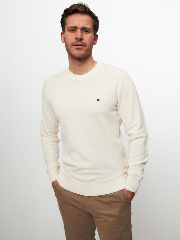 Ontdek de Katoenen rib trui van Tommy Hilfiger in de kleur crème bij Orangebag. Op werkdagen voor 21:45 besteld, morgen in huis.