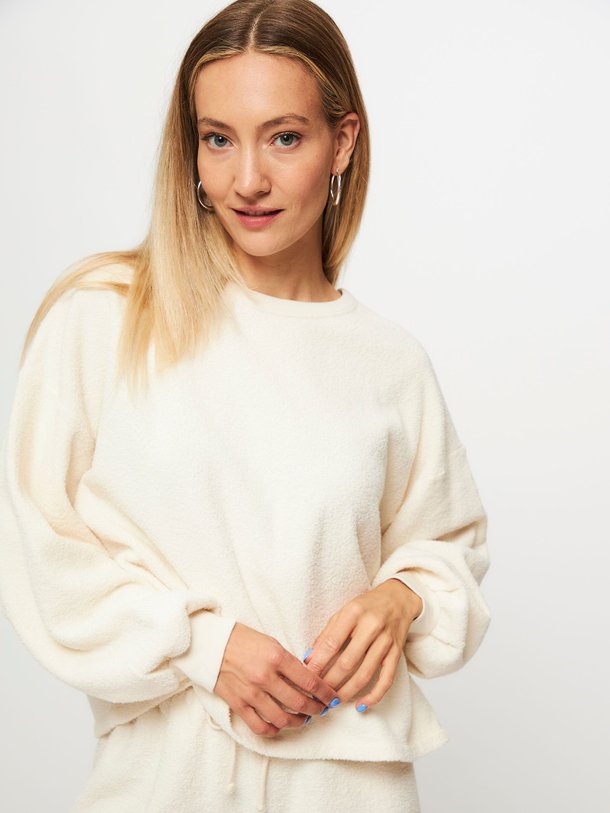 Ontdek de Bobypark katoenen oversized badstof sweater van American Vintage in de kleur ecru bij Orangebag. Op werkdagen voor 21:45 besteld, morgen in huis.