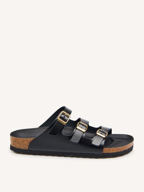 Ontdek de Florida lederen slippers van Birkenstock in de kleur Zwart bij Orangebag. Op werkdagen voor 21:45 besteld, morgen in huis.