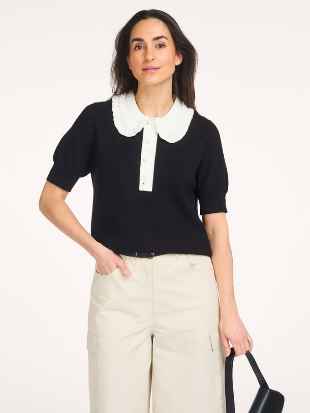 Ontdek de Jewelry viscosemix polo top van Essentiel Antwerp in de kleur Zwart bij Orangebag. Op werkdagen voor 21:45 besteld, morgen in huis.