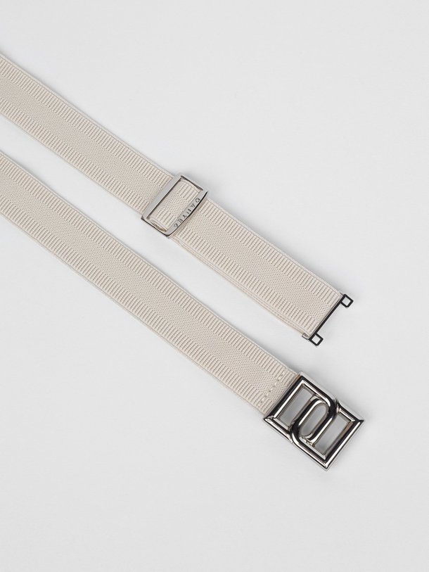 Ontdek de Monogram Petite elastische riem van Dante 6 in de kleur crème bij Orangebag. Op werkdagen voor 21:45 besteld, morgen in huis.