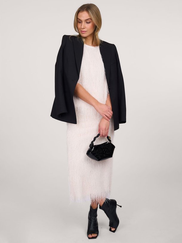 Ontdek de Fallon geweven rok met franjes van Copenhagen Muse in de kleur crème bij Orangebag. Op werkdagen voor 21:45 besteld, morgen in huis.