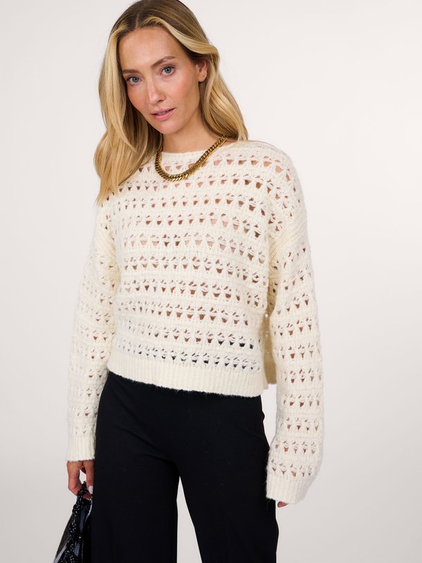 Ontdek de Imeny alpacamix opengewerkte trui van Drykorn in de kleur off-white bij Orangebag. Op werkdagen voor 21:45 besteld, morgen in huis.