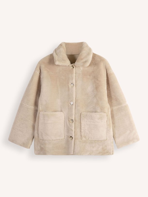 Ontdek de Elho reversible fake fur mantel van Suncoo in de kleur beige bij Orangebag. Op werkdagen voor 21:45 besteld, morgen in huis.