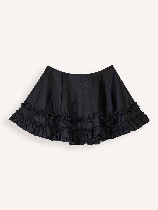 Ontdek de Duchesse geweven rok met ruches van Ganni in de kleur Zwart bij Orangebag. Op werkdagen voor 21:45 besteld, morgen in huis.