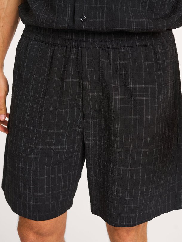 Ontdek de Geweven short met dessin van OLAF in de kleur zwart bij Orangebag. Op werkdagen voor 21:45 besteld, morgen in huis.