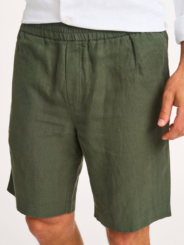 Ontdek de Smith katoen/linnenmix short van Samsoe Samsoe in de kleur donkergroen bij Orangebag. Op werkdagen voor 21:45 besteld, morgen in huis.