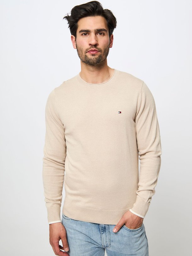 Ontdek de Katoenen gemêleerde trui van Tommy Hilfiger in de kleur zand bij Orangebag. Op werkdagen voor 21:45 besteld, morgen in huis.