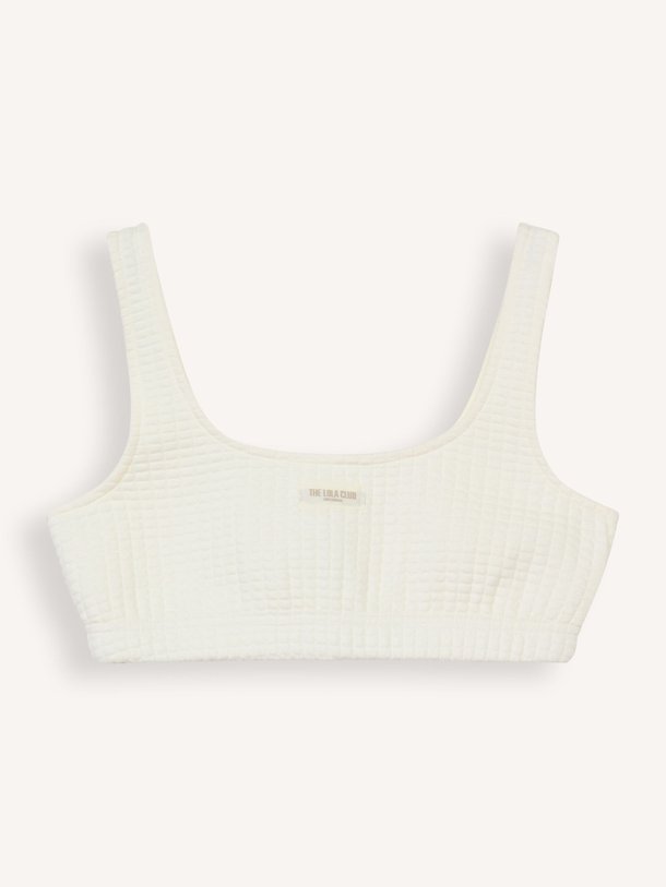 Ontdek de Lena katoenmix top met structuur van The Lola Club in de kleur crème bij Orangebag. Op werkdagen voor 21:45 besteld, morgen in huis.