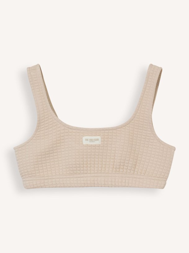 Ontdek de Lena katoenmix top met structuur van The Lola Club in de kleur taupe bij Orangebag. Op werkdagen voor 21:45 besteld, morgen in huis.