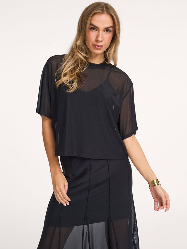 Ontdek de Tenz geweven mesh top van Dante 6 in de kleur Zwart bij Orangebag. Op werkdagen voor 21:45 besteld, morgen in huis.