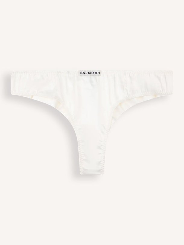 Ontdek de Carl brazilian slip van Love Stories in de kleur off-white bij Orangebag. Op werkdagen voor 21:45 besteld, morgen in huis.
