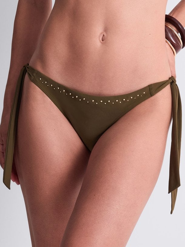 Ontdek de Summer Stars bikinislip van Aubade in de kleur Kaki bij Orangebag. Op werkdagen voor 21:45 besteld, morgen in huis.