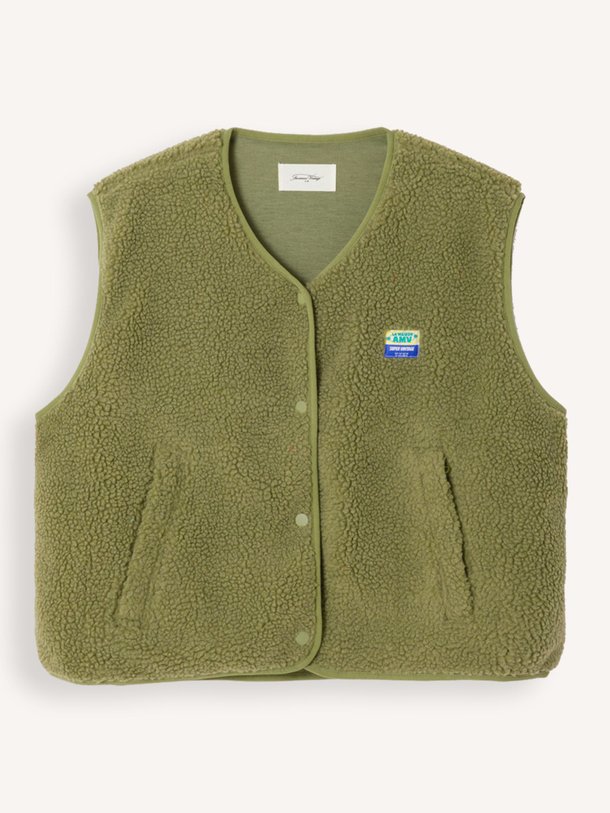 Ontdek de Hoktown geweven teddy gilet van American Vintage in de kleur Donkergroen bij Orangebag. Op werkdagen voor 21:45 besteld, morgen in huis.