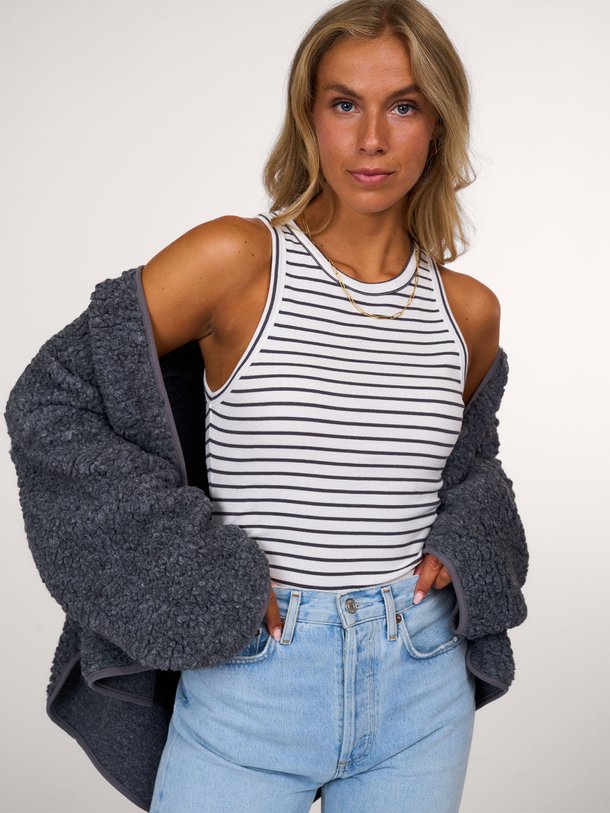 Club L`Avenir Lotus - Organic Cotton Gestreepte Rib Tanktop - Wit Ontdek de Lotus organic cotton gestreepte rib tanktop van Club L`avenir in de kleur wit bij Orangebag. Op werkdagen voor 21:45 besteld, morgen in huis.