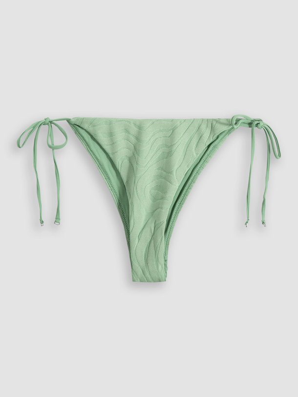Ontdek de SecondWave Tie Side Rio Pant van Seafolly in de kleur lichtgroen bij Orangebag. Op werkdagen voor 21:45 besteld, morgen in huis.