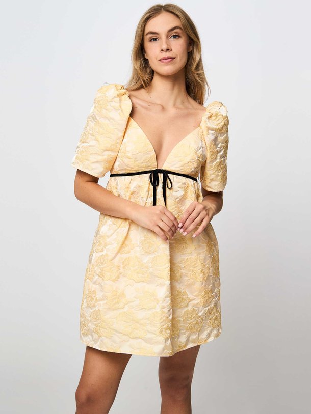 Ontdek de Jacquard geweven jurk met dessin van Ganni in de kleur geel bij Orangebag. Op werkdagen voor 21:45 besteld, morgen in huis.