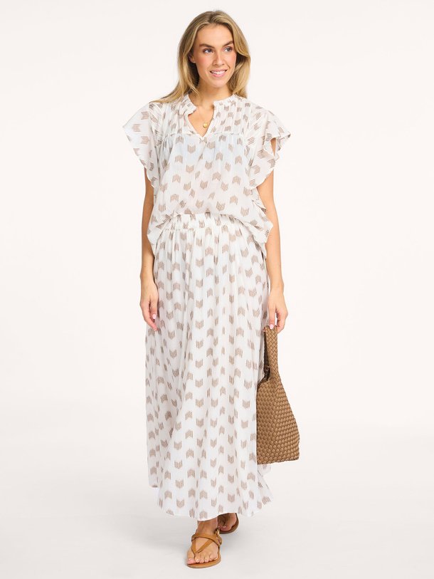 Ontdek de Danee katoenen top met print van By-Bar in de kleur Crème bij Orangebag. Op werkdagen voor 21:45 besteld, morgen in huis.