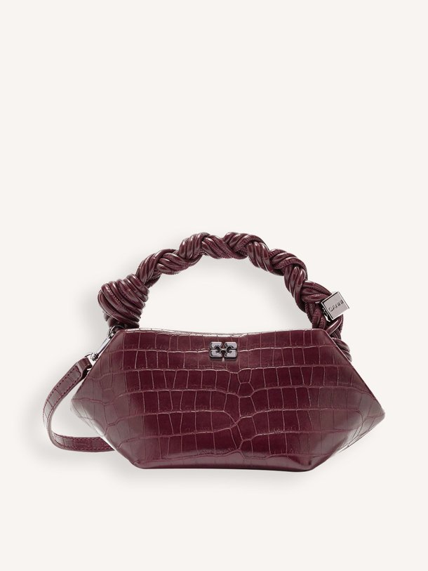 Ontdek de Bou mini croco crossbody bag van Ganni in de kleur Bordeauxrood bij Orangebag. Op werkdagen voor 21:45 besteld, morgen in huis.