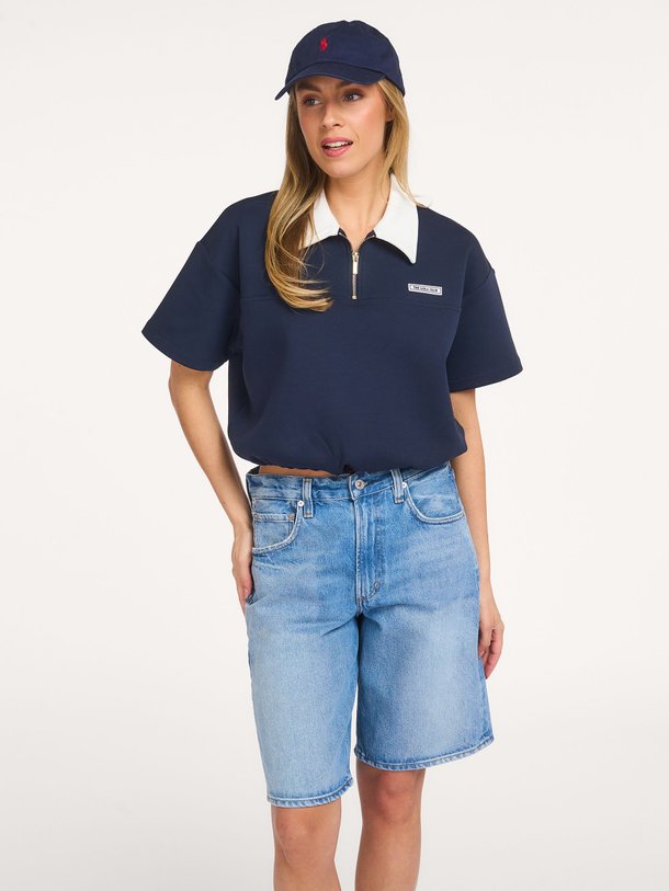 Ontdek de Millie katoenmix polo top van The Lola Club in de kleur Donkerblauw bij Orangebag. Op werkdagen voor 21:45 besteld, morgen in huis.