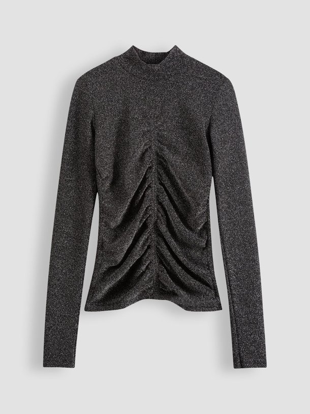 Ontdek de Eliza jersey top met lurex van Freebird in de kleur zwart bij Orangebag. Op werkdagen voor 21:45 besteld, morgen in huis.