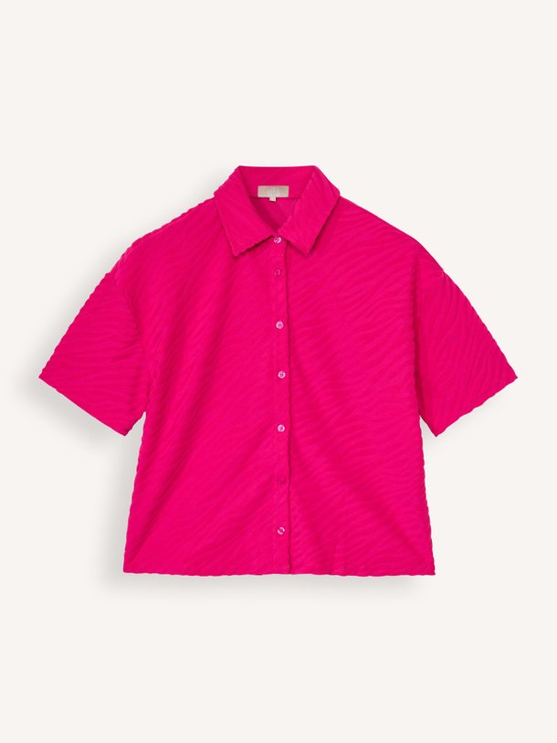 Ontdek de Indy jersey blouse met dessin van The Lola Club in de kleur roze bij Orangebag. Op werkdagen voor 21:45 besteld, morgen in huis.