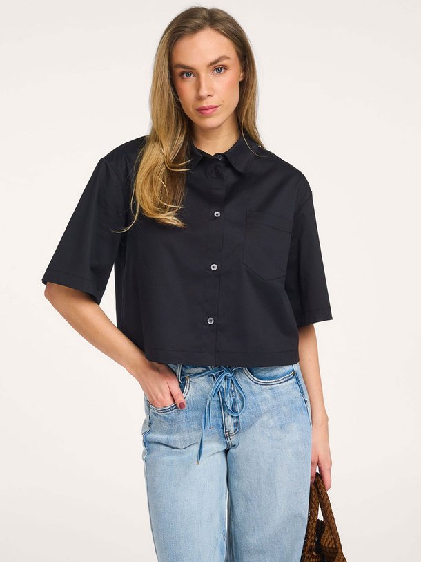 Ontdek de Polien katoenmix blouse van Ruby Tuesday in de kleur Zwart bij Orangebag. Op werkdagen voor 21:45 besteld, morgen in huis.