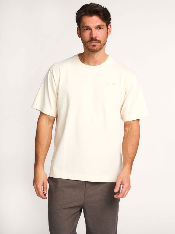 Ontdek de Organic cotton T-shirt van OLAF in de kleur Off-white bij Orangebag. Op werkdagen voor 21:45 besteld, morgen in huis.