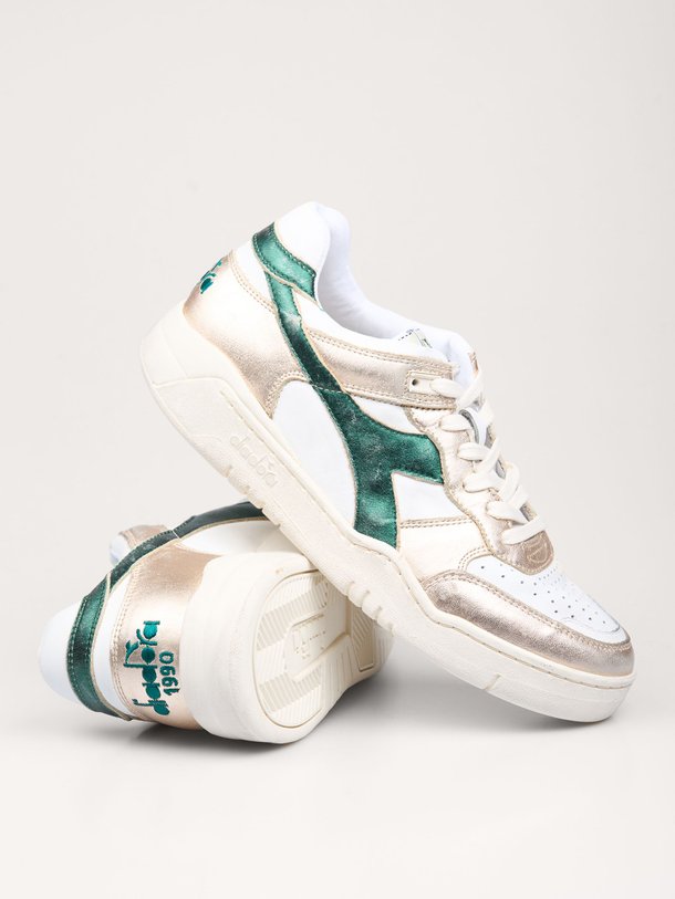 Ontdek de B.560 lederen metallic sneakers van Diadora in de kleur wit bij Orangebag. Op werkdagen voor 21:45 besteld, morgen in huis.