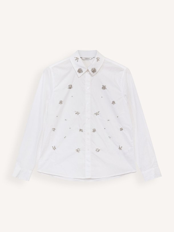 Ontdek de Katoenen blouse met applicaties van Summum in de kleur wit bij Orangebag. Op werkdagen voor 21:45 besteld, morgen in huis.
