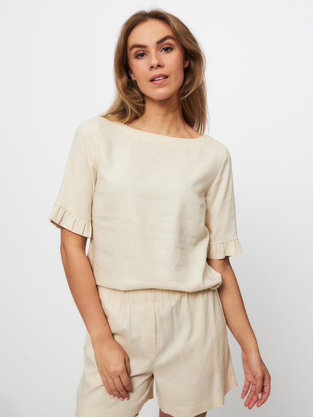 Ontdek de Darrel viscose/linnenmix top van Modstrom in de kleur zand bij Orangebag. Op werkdagen voor 21:45 besteld, morgen in huis.