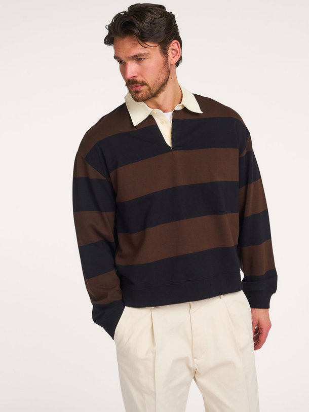 Ontdek de David organic cotton polo sweater van NN.07 in de kleur Donkerbruin bij Orangebag. Op werkdagen voor 21:45 besteld, morgen in huis.