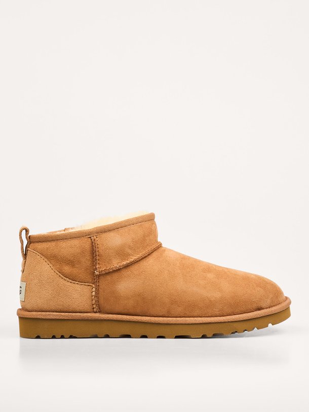 Ontdek de Classic ultra mini enkellaarzen van Ugg in de kleur cognac bij Orangebag. Op werkdagen voor 21:45 besteld, morgen in huis.