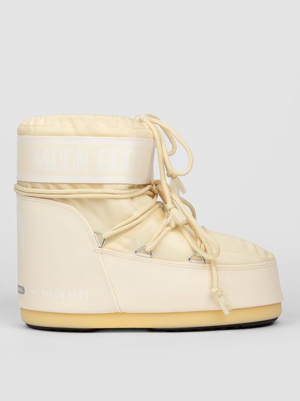 Ontdek de Lage gewatteerde nylon snowboots van Moon Boot in de kleur crème bij Orangebag. Op werkdagen voor 21:45 besteld, morgen in huis.